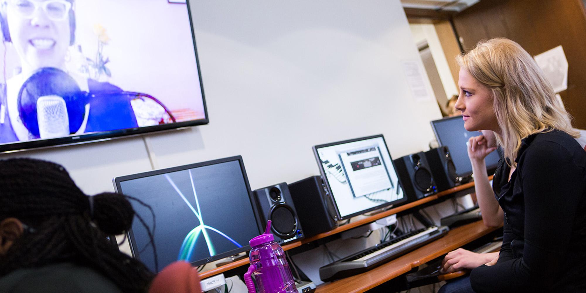 Female Student In Front Of A Screen